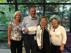 Bardwell Valley Ladies Committee present Dr Charles Scarf, Head of Spina Bifida Unit, with a cheque for $5000 in 2017